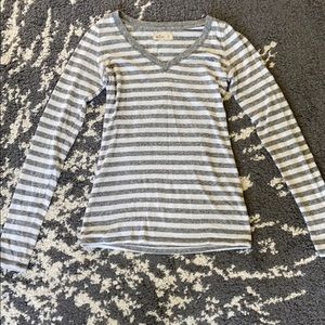 Grey and white striped long-sleeved v-neck